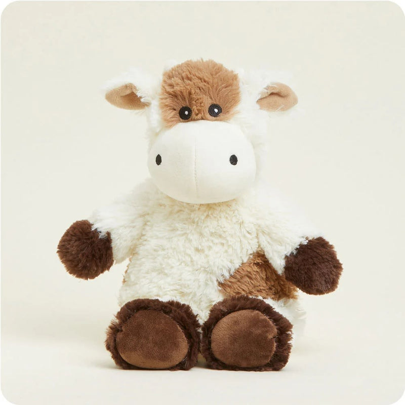 Soft and weighted plush animal resembling a cow, microwaveable and scented with dried lavender, ideal for health remedies, indoor play, and children's toys collections.