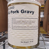 Large metal canister of freeze-dried biscuits with pork gravy, featuring preparation instructions and storage advice, ideal for emergency supplies and long-term food storage.