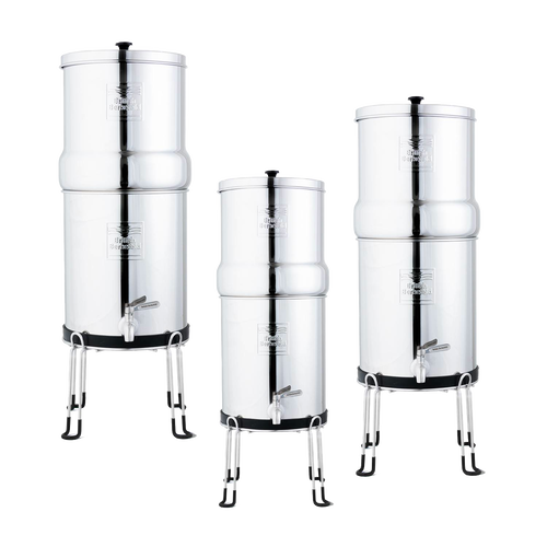 Three polished stainless steel gravity water filters elevated on sturdy British Berkefeld stands with protective legs, featured in Appliances, Emergency Supplies, and Water Heating collections.