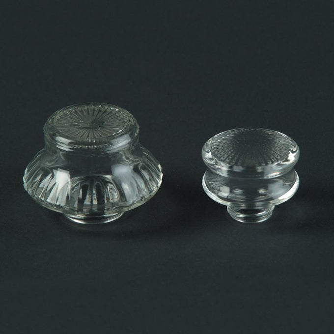 Set of two clear glass percolator tops in small and large sizes with textured designs, crafted for secure fit and durable use in Kitchen & Food, Brewing Coffee and Tea, and Best Sellers collections.