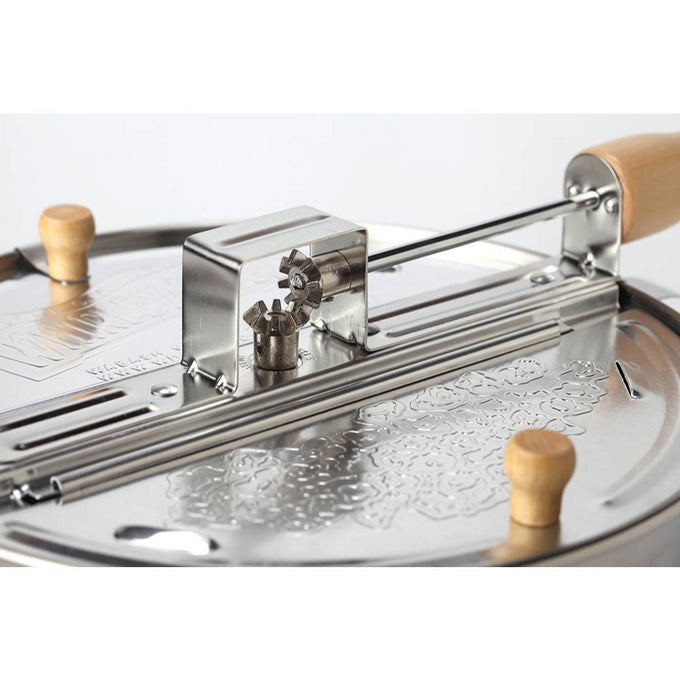 Close-up of a stainless steel popcorn popper lid featuring durable metal gears and wooden handles, designed for Kitchen & Food, Cookware, Pots and Pans, and Best Sellers collections.