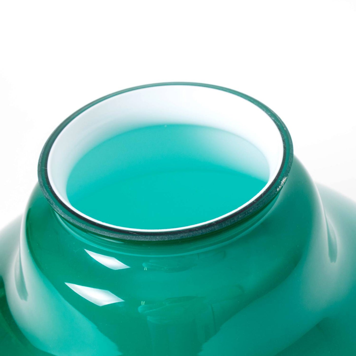 Close-up of a smooth emerald glass lamp shade with a white interior lining, designed for Aladdin hanging lamps, featured in Lamps & Lighting, Parts and Accessories, Lamp Shades, and Best Sellers collections.