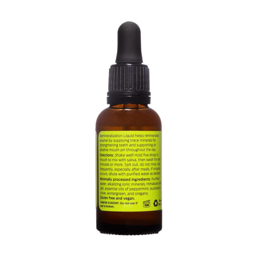 Amber glass bottle with black dropper cap containing handcrafted remineralization liquid for tooth enamel, gluten-free and vegan, made in USA, featured in Health & Wellness and Grooming collections.