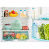 Light green fabric storage bag with drawstring closure placed inside a refrigerator surrounded by fresh fruits, vegetables, dairy products, and bottled water, ideal for kitchen and food storage collections.
