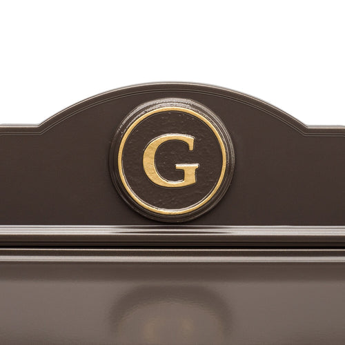 Close-up of handcrafted bronze wall mount mailbox featuring a gold letter G monogram, made in USA, perfect for Home & Decor, Mailboxes and Address Signs, and USA Made collections.