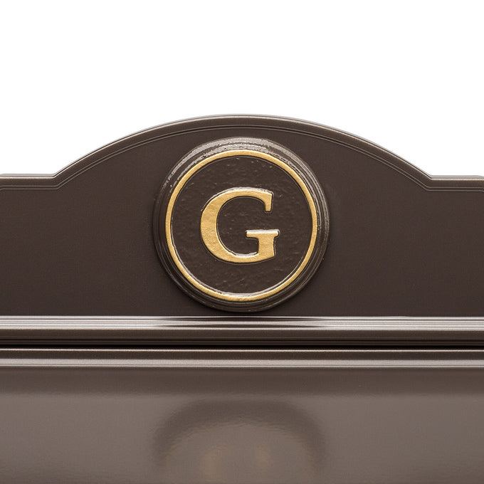 Close-up of handcrafted bronze wall mount mailbox featuring a gold letter G monogram, made in USA, perfect for Home & Decor, Mailboxes and Address Signs, and USA Made collections.