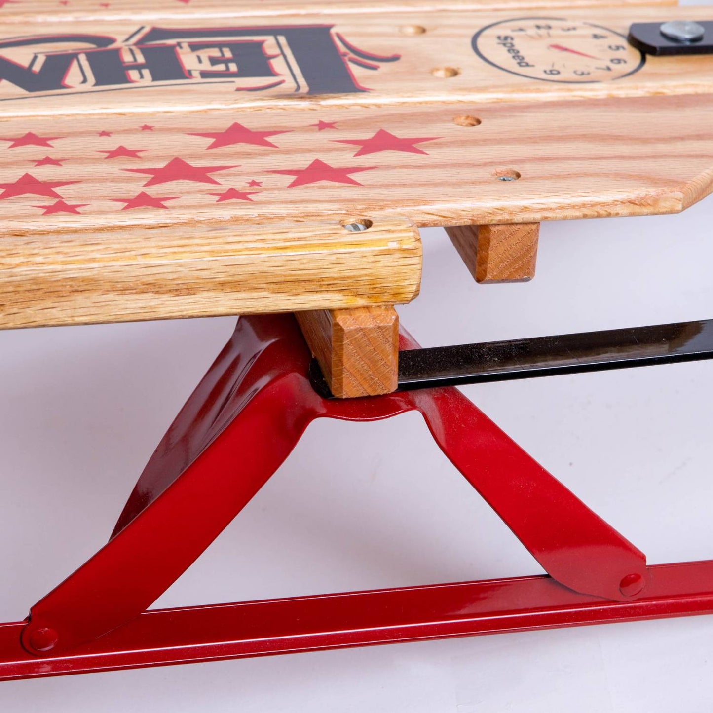 Close-up of handcrafted Amish made solid oak wood platform with smooth finish and red metal runners, part of a sturdy outdoor play sled in Toys, Books & Games and USA Made collections.