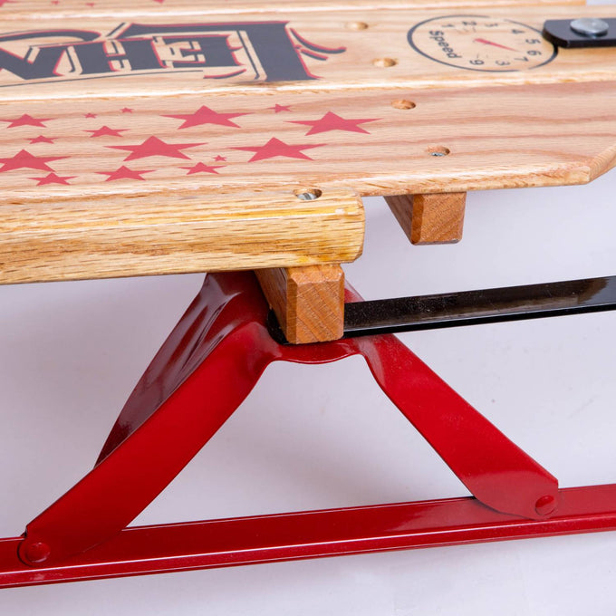 Close-up of handcrafted Amish made solid oak wood platform with smooth finish and red metal runners, part of a sturdy outdoor play sled in Toys, Books & Games and USA Made collections.