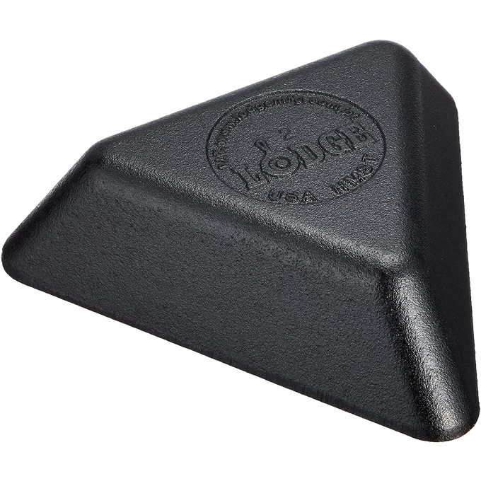 Seasoned cast iron triangle mini server with a natural easy-release finish, handcrafted in the USA, perfect for serving appetizers, desserts, and dips, featured in Kitchen & Food and Cookware collections.