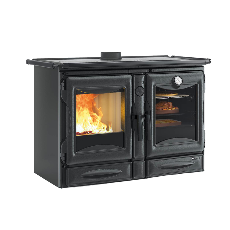 Black enameled cast iron wood stove with visible fire through left door and cooking oven with food and thermometer on right, part of Stoves and Cookstoves collections.