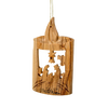 Handcrafted olive wood ornament featuring a carved nativity scene with a candle silhouette, part of Holiday Decor, Home & Decor, and Best Sellers collections.