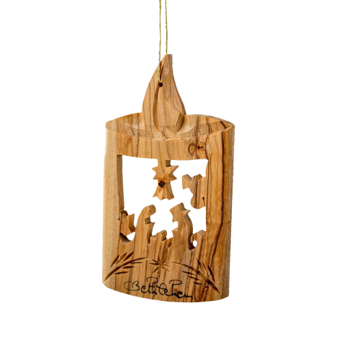 Handcrafted olive wood ornament featuring a carved nativity scene with a candle silhouette, part of Holiday Decor, Home & Decor, and Best Sellers collections.