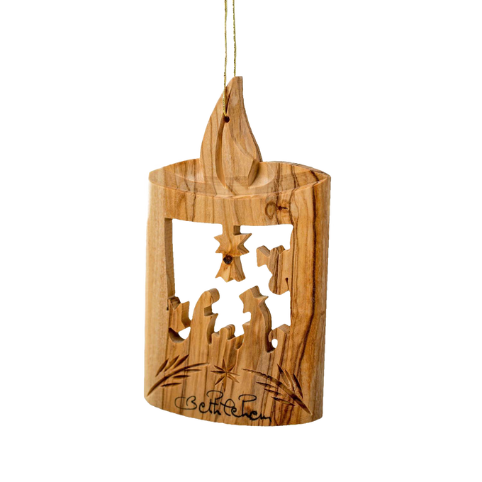 Handcrafted olive wood ornament featuring a carved nativity scene with a candle silhouette, part of Holiday Decor, Home & Decor, and Best Sellers collections.