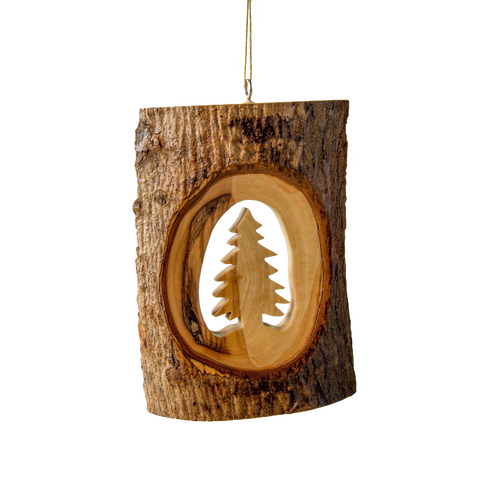 Handcrafted olive wood ornament featuring a natural bark slice with a carved Christmas tree silhouette, perfect for holiday decor and home accents.