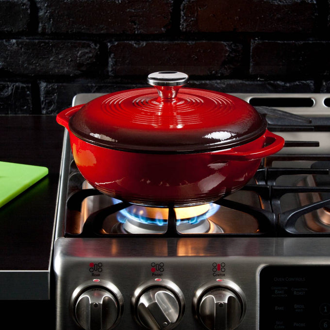Handcrafted bright red enameled cast iron 3-quart Dutch oven with metal knob, heating on stove burner, perfect for Kitchen & Food, Cookware, Cast Iron, Best Sellers, and Bread Making Supplies collections.