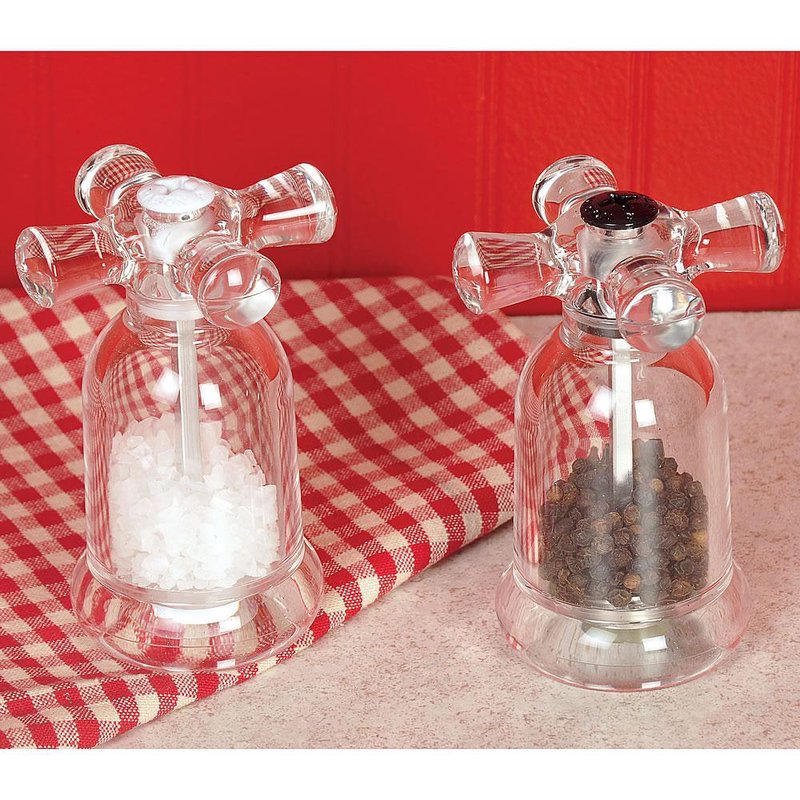 Pair of clear acrylic salt and pepper mills styled like vintage faucet handles, filled with coarse sea salt and black peppercorns, featured in Kitchen & Food, Dinnerware, Storage and Serving, Best Sellers, and Promo Eligible collections.