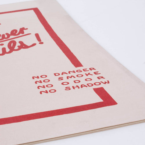 Close-up of a beige booklet page with bold red handwritten text reading "No Danger No Smoke No Odor No Shadow," part of a handcrafted angle lamp guide in the Toys, Books & Games and Heritage and Lifestyle Books collections.