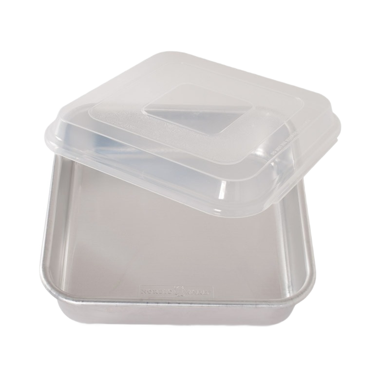 Square aluminum cake pan with encapsulated galvanized steel rims to prevent warping and a clear plastic lid for convenient storage, ideal for baking in Kitchen & Food collections.