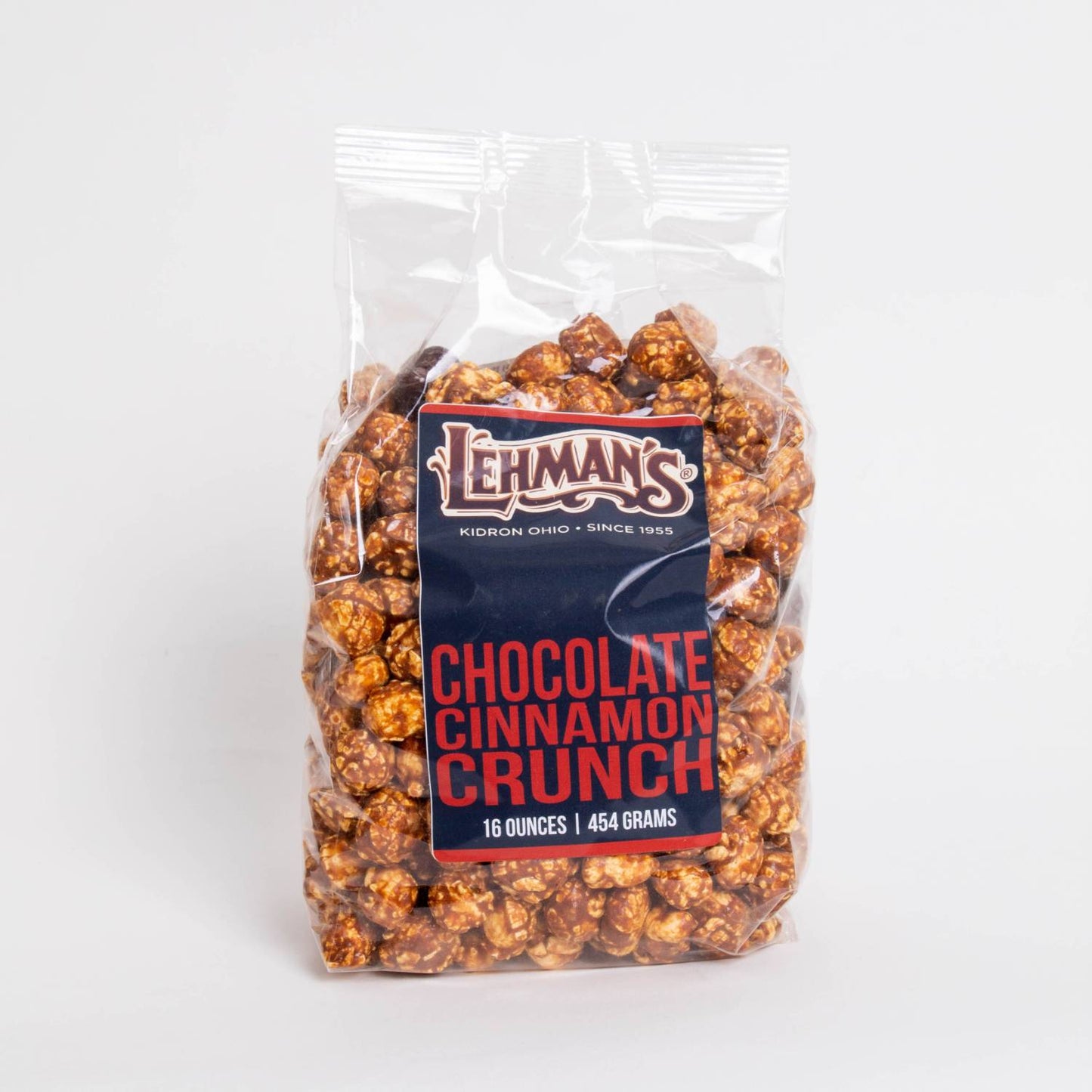 Clear bag of handcrafted Lehman's chocolate cinnamon crunch popcorn, a sweet and spicy snack made in USA, featured in Kitchen & Food, Snacks and Sweets, Popcorn, USA Made, and Best Sellers collections.