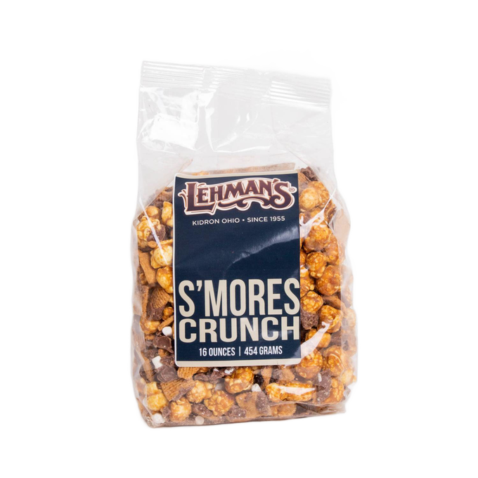 Clear bag of handcrafted s'mores flavored caramel popcorn crunch with chocolate and marshmallow pieces, made in USA and featured in Kitchen & Food, Snacks and Sweets, Popcorn, and Best Sellers collections.