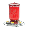 Rustic red-tinted glass hummingbird feeder with metal base and yellow flower feeding ports, designed for easy nectar filling, featured in Farm, Garden & Tool and Animal Care collections.