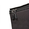 Close-up of a sturdy black ripstop fiber zippered bag with reinforced padded walls, designed for secure storage and transport of lamps and reflectors, ideal for camping and outdoor use.