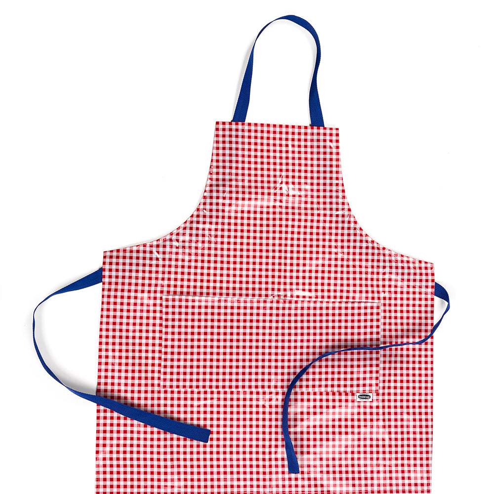 Handcrafted vinyl apron with classic red gingham pattern and adjustable blue straps, featuring two spacious pockets, designed for Kitchen & Food, Kitchen Accessories, USA Made, and Best Sellers collections.