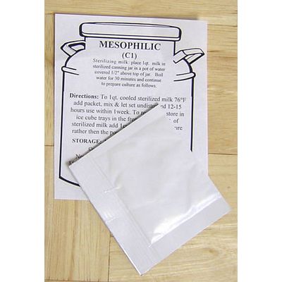 Clear sealed packet of mesophilic starter culture placed on instructional sheet with cheese milk preparation steps, ideal for Kitchen & Food, Specialty Equipment, DIY Cheese and Yogurt, Best Sellers, and Promo Eligible collections.