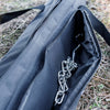 Black transport bag with zipper partially open to display a metal chain inside, designed for secure storage and easy carrying of cooking tripods, ideal for camping and farm use in Farm, Garden & Tool and Best Sellers collections.