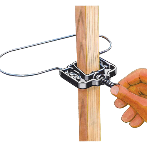 Hand tightening a resin clamp to secure a galvanized steel ring around a wooden stake, designed for tomato plant support in farm and garden settings, USA made and best seller.