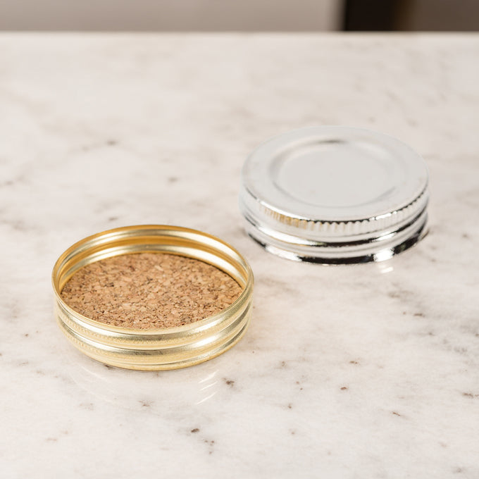 Two metal oil lamp caps with female coarse threads and cork inserts, compatible with most glass fonts, featured in Lamps & Lighting, Parts and Accessories, Lamp Burners and Collars, Best Sellers, Promo Eligible collections.