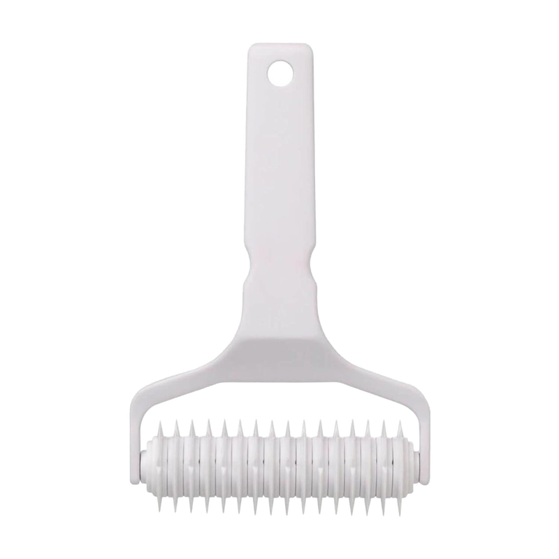 White heavy-duty plastic lattice cutter with evenly spaced blades and a hole in the handle for hanging, ideal for Kitchen & Food, Baking Supplies, and Cooking and Baking Helpers collections.
