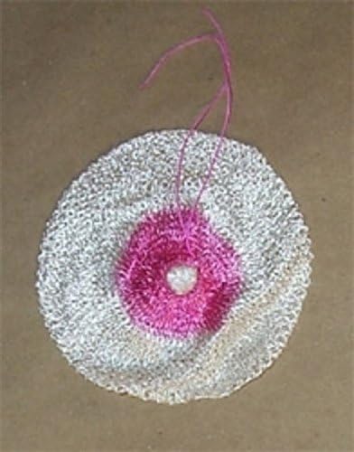 Circular knitted tie-on mantle in white and pink yarn with loose ends, designed for use with gas lights in Lamps & Lighting, Gas Lights, Best Sellers, and Promo Eligible collections.