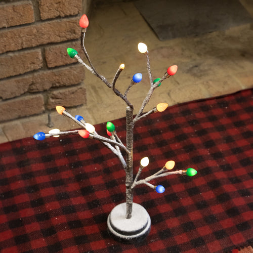 Handcrafted decorative tree with snow-frosted branches and vibrant colored bulb caps in red, green, blue, orange, and white, ideal for Home & Decor, Holiday Decor, Best Sellers, Promo Eligible collections.