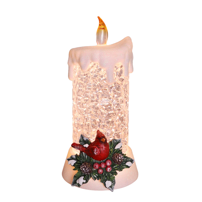 Handcrafted lighted candle with textured glitter body, topped with faux melted wax and a glowing flame, featuring a detailed cardinal and holly sprig at its base, ideal for Home & Decor, Holiday Decor, Best Sellers, and Promo Eligible collections.