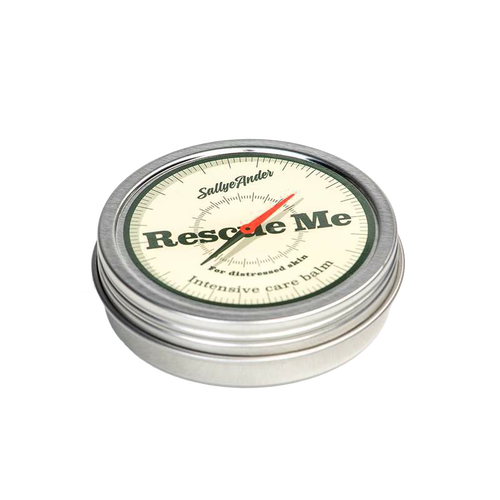 Small round metal tin with screw-on lid featuring vintage compass design and text indicating an all-natural intensive care balm made in the USA, part of Health & Wellness and Best Sellers collections.