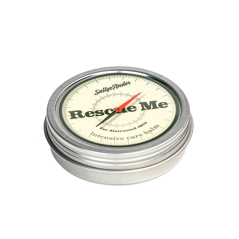 Small round metal tin with screw-on lid featuring vintage compass design and text indicating an all-natural intensive care balm made in the USA, part of Health & Wellness and Best Sellers collections.