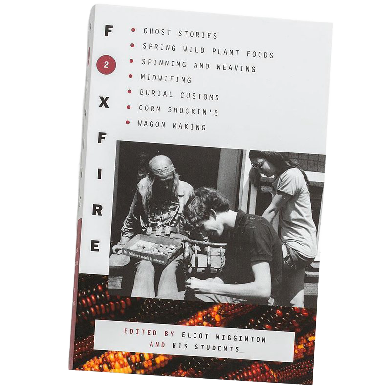 Book cover of The Foxfire Books - Volume 2 featuring topics on Appalachian traditions such as ghost stories, midwifing, weaving, and burial customs, shown in black, white, and earthy orange tones, in collections including Toys, Books & Games, Heritage and Lifestyle Books, and Best Sellers.