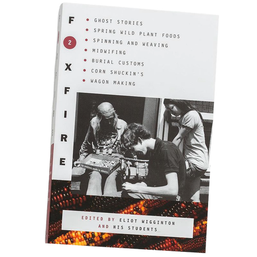 Book cover of The Foxfire Books - Volume 2 featuring topics on Appalachian traditions such as ghost stories, midwifing, weaving, and burial customs, shown in black, white, and earthy orange tones, in collections including Toys, Books & Games, Heritage and Lifestyle Books, and Best Sellers.