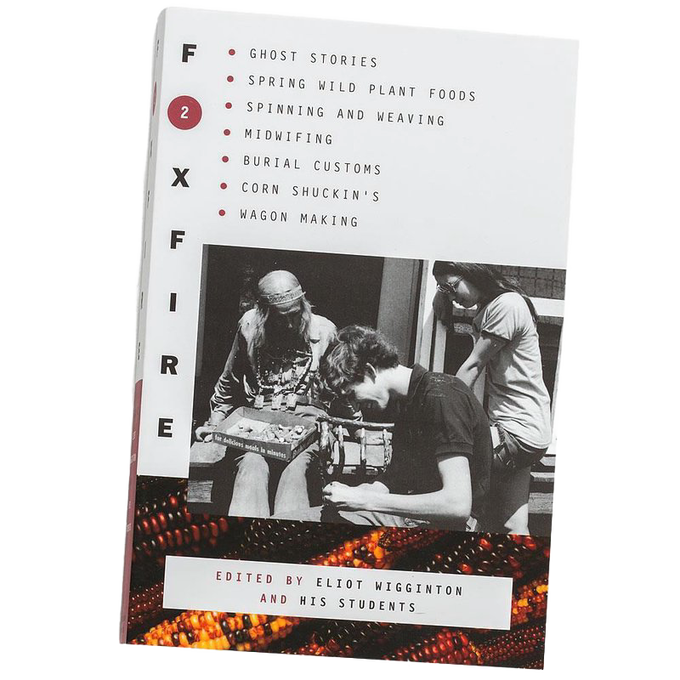 Book cover of The Foxfire Books - Volume 2 featuring topics on Appalachian traditions such as ghost stories, midwifing, weaving, and burial customs, shown in black, white, and earthy orange tones, in collections including Toys, Books & Games, Heritage and Lifestyle Books, and Best Sellers.