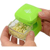 Compact green garlic prep tool with clear container holding minced garlic, designed for easy peeling, slicing, grating, and storage, ideal for Kitchen & Food and Food Prep collections.