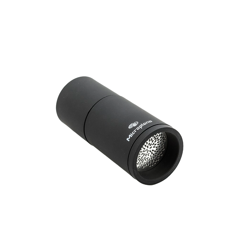 Matte black handheld spice mill with metal grinding mechanism, designed for fresh cinnamon and nutmeg, featured in Kitchen & Food, Brewing Coffee and Tea, Best Sellers, and Promo Eligible collections.