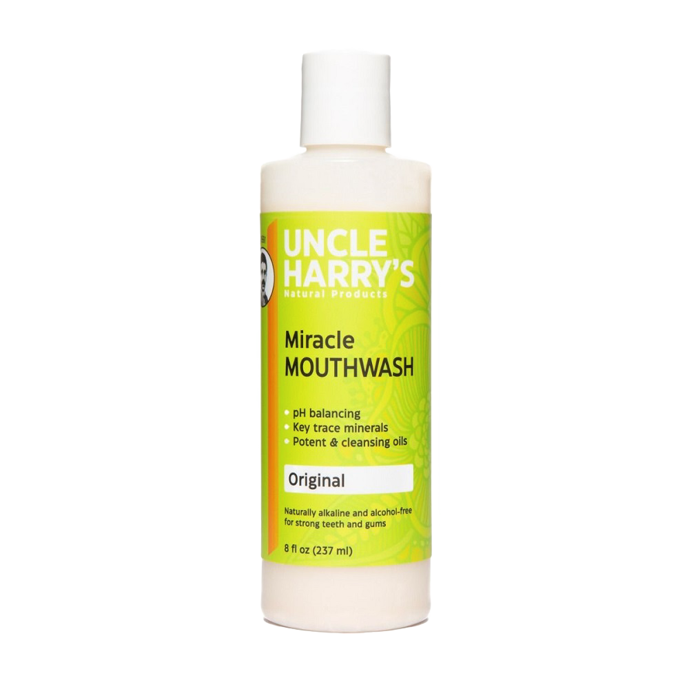 Plastic bottle of natural, alcohol-free mouthwash labeled as pH balancing with trace minerals and cleansing oils, crafted for strong teeth and gums, featured in Health & Wellness, Grooming and Personal Hygiene, USA Made, and Best Sellers collections.
