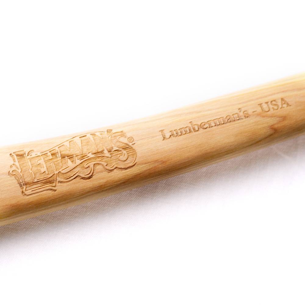 Close-up of a smooth wooden hickory handle with Lehman's logo and "Lumberman's USA" engraving, showcasing handcrafted quality in Farm, Garden & Tool and USA Made collections.