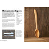 Open book spread showing instructions and materials list for carving a monogrammed wooden spoon, featuring a handcrafted wooden spoon with a carved monogram resting on a rustic wooden surface, part of Toys, Books & Games, Books, Home and Garden How-To Books, and Best Sellers collections.