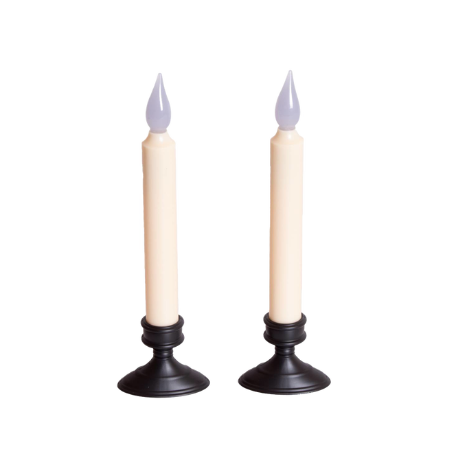 Pair of slender cordless LED taper candles with black bases and amber flickering flames, designed for safe window display and holiday decor in lamps and lighting collections.
