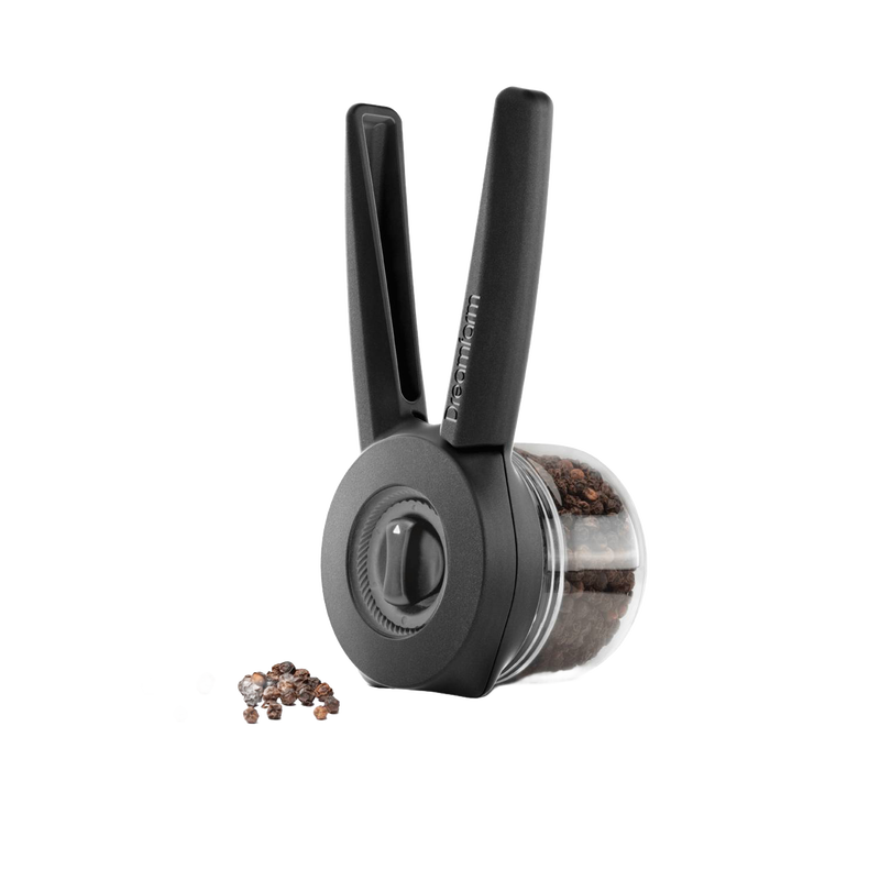 Black and clear handheld spice mill with adjustable grind dial and ergonomic handles, shown with whole peppercorns, designed for Kitchen & Food, Dinnerware, and Best Sellers collections.