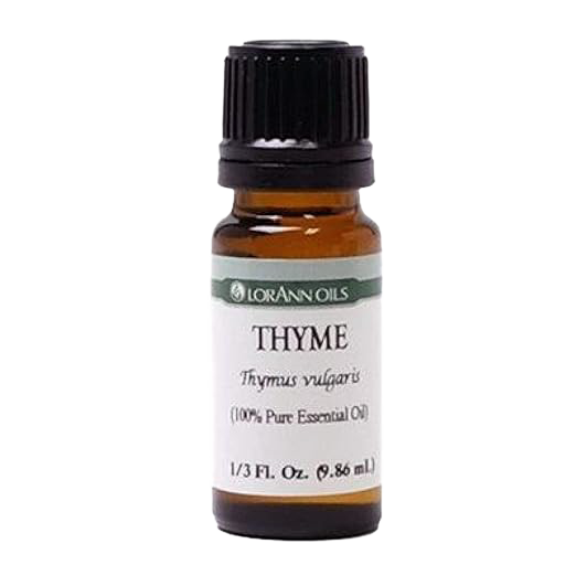 Amber glass bottle with black cap containing pure thyme essential oil, handcrafted and quality tested for aromatherapy, health remedies, soapmaking, and candlemaking uses.