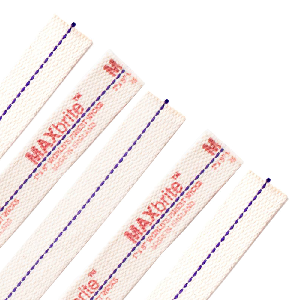 Close-up of handcrafted flat cotton wicks with purple center stitching and red printed branding, designed for reliable fuel delivery in oil lamps, ideal for emergency supplies and lamps collections.