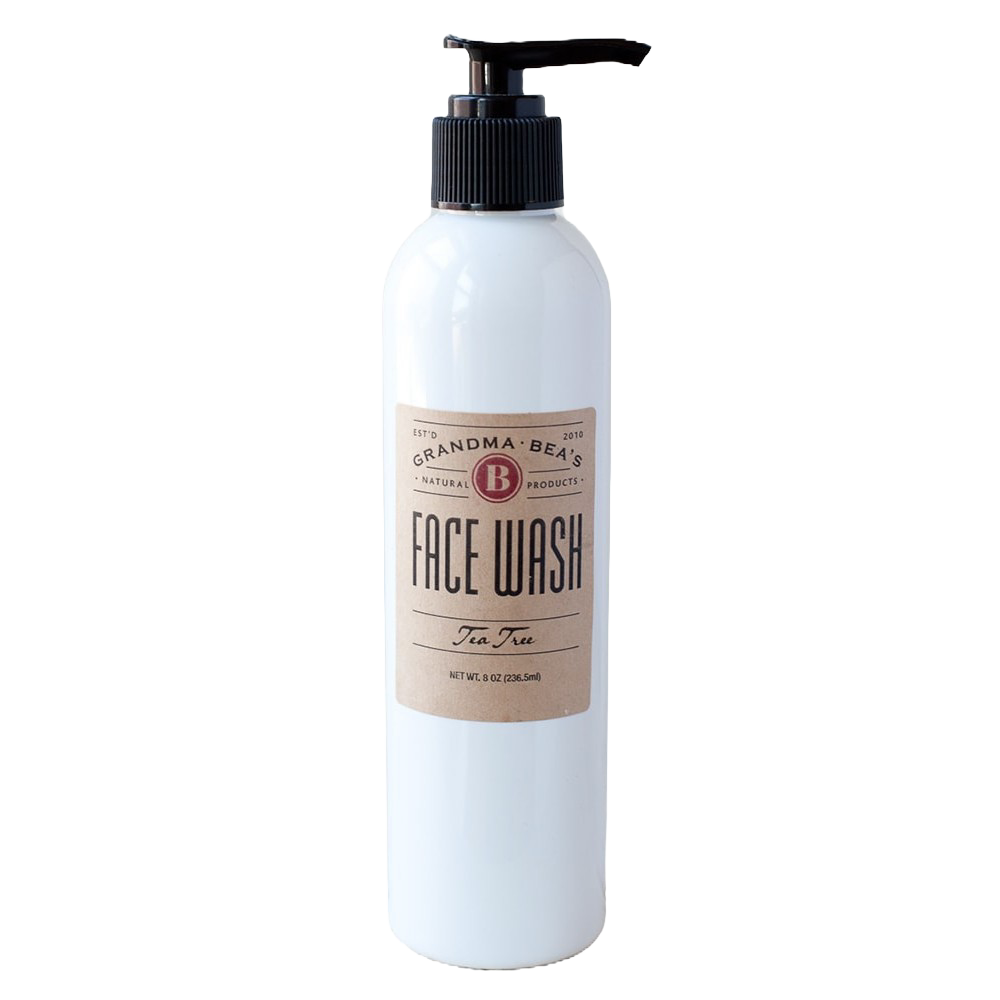 White 8-ounce pump bottle of all-natural tea tree face wash with a simple tan label, handcrafted in the USA, featured in Health & Wellness and Grooming collections.